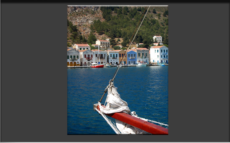 Harbour of Greek Island Kastellorizo with picturesque Lanes, opposite the Turkish Coastline